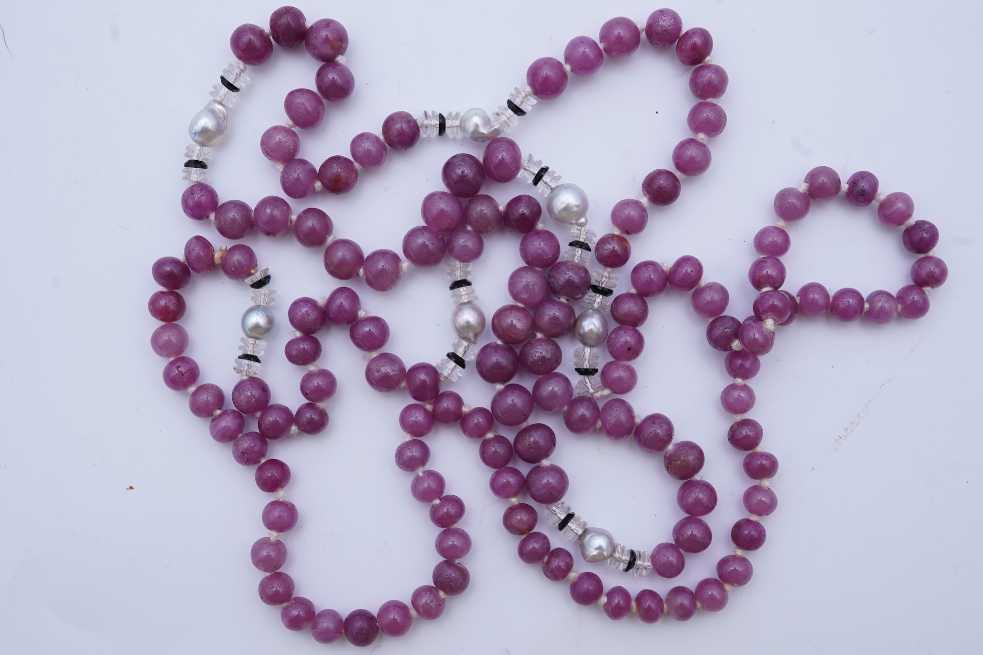 A ruby bead, onyx, rock crystal and pearl necklace